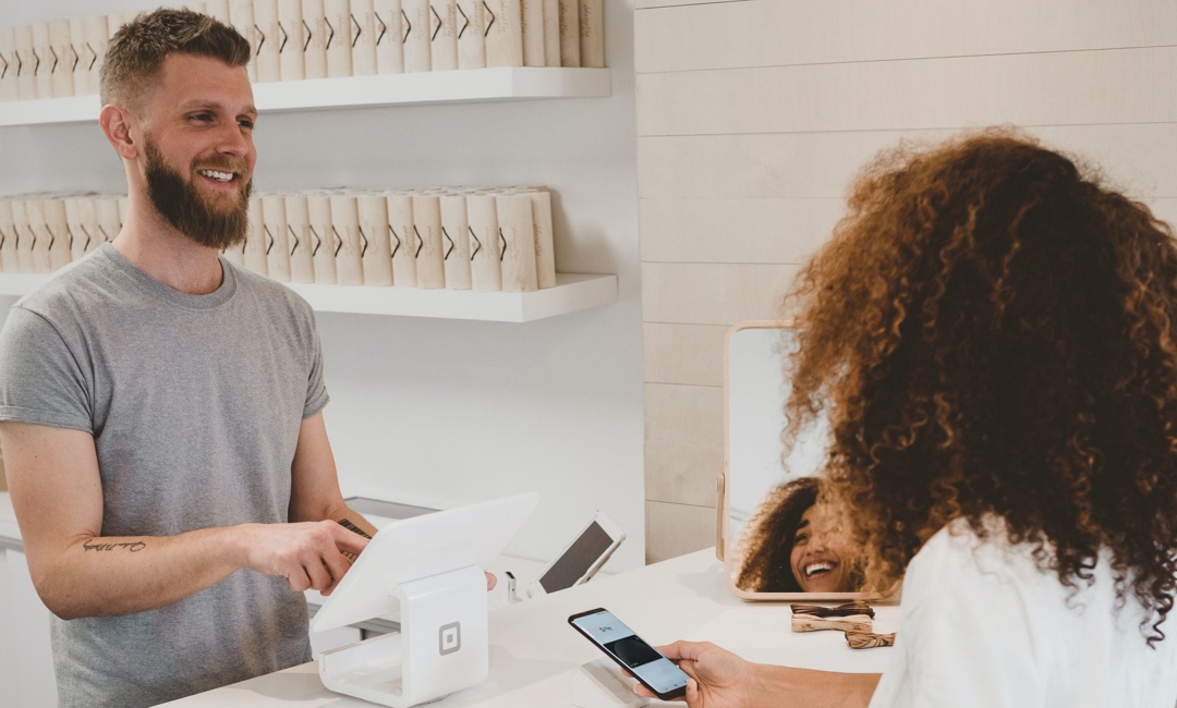 sales transaction with man and woman