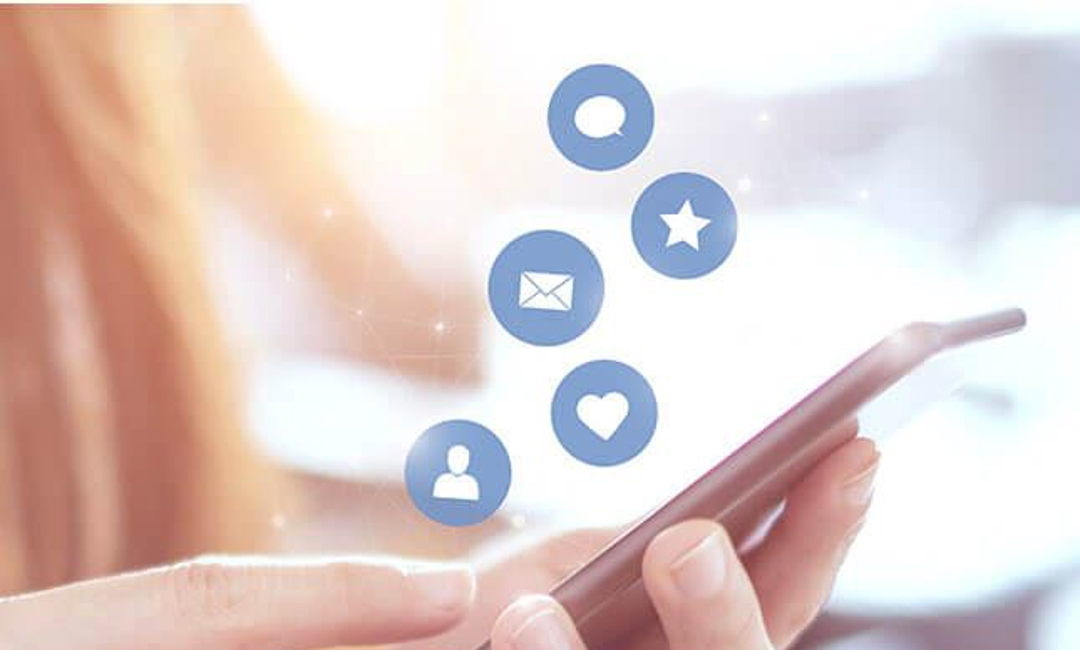 iPhone with graphics over the image show likes, comments, and followers