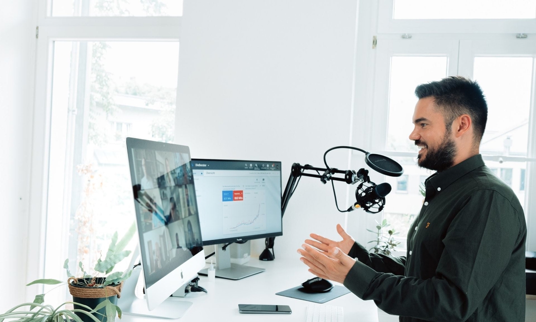 Man presents during a webinar