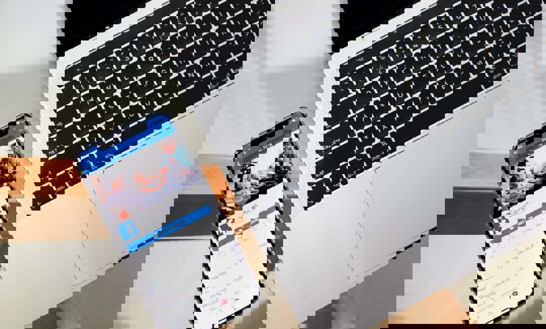 Picture of Facebook business page on mobile phone