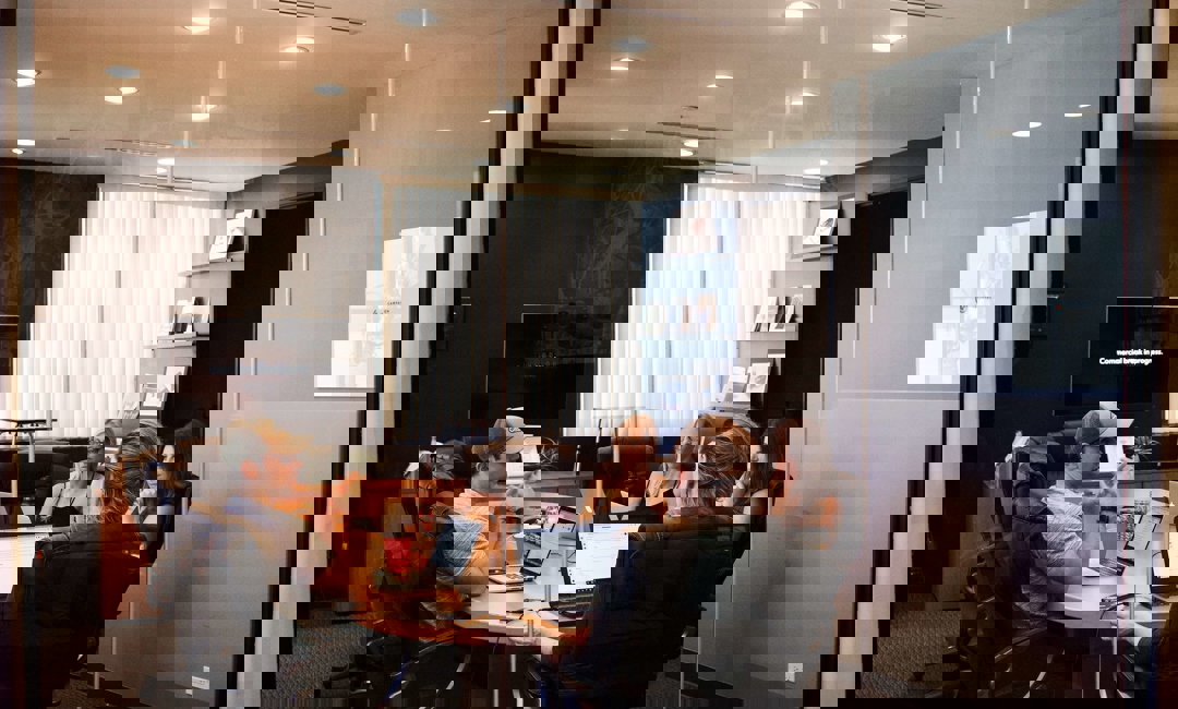 Home services professionals meeting about human resources for small business