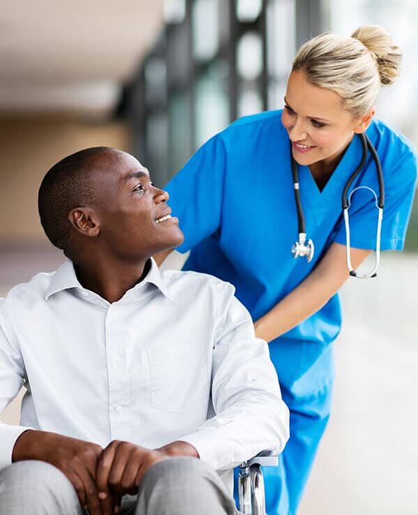 Patient looking at nurse smiling